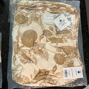 Kate Quinn classic sunflower crib sheet, kimono bodysuit, and booties bundle